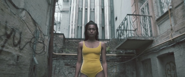Video Reference: snapshot, girl, street, screenshot, building, Person