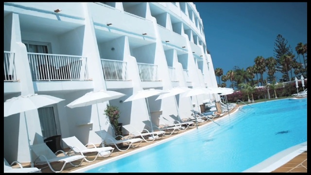 Video Reference: property, swimming pool, resort, leisure, hotel, condominium, real estate, vacation, apartment, building, Person