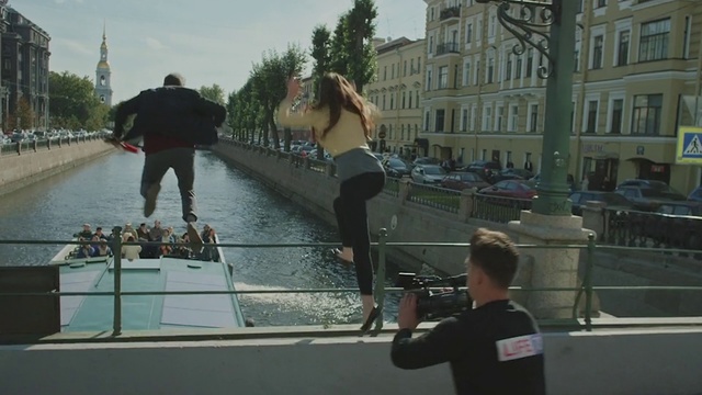 Video Reference: Snapshot, Fun, Footwear, Pedestrian, Urban area, Leisure, Photography, Recreation, Travel, Tourism