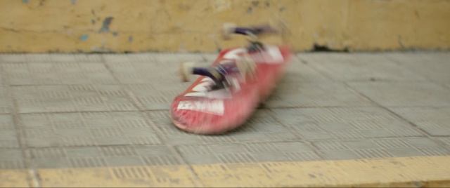 Video Reference: footwear, red, mode of transport, shoe, outdoor shoe, floor, leg, flooring, foot, sports equipment