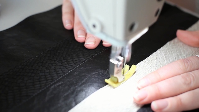 Video Reference: sewing, sewing machine, material, finger, nail