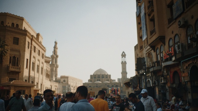 Video Reference: People, City, Town square, Public space, Crowd, Human settlement, Town, Tourism, Pedestrian, Building