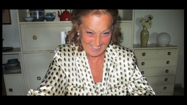 Video Reference: hair, face, facial expression, skin, human hair color, nose, head, hairstyle, fashion accessory, forehead, Person