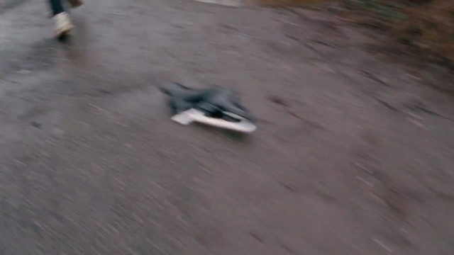 Video Reference: asphalt, mode of transport, floor, geological phenomenon, flooring, soil, road surface, sky, adventure