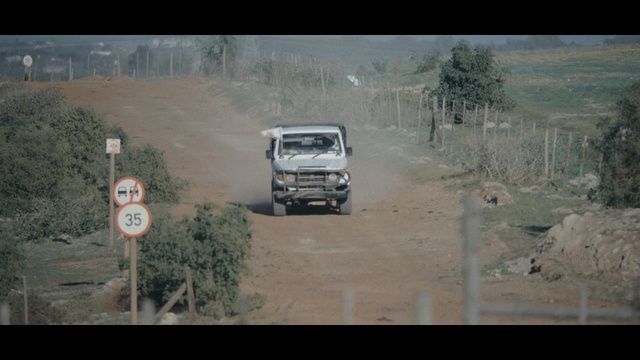 Video Reference: car, land vehicle, motor vehicle, vehicle, off roading, road, mode of transport, transport, off road vehicle, off road racing, Person