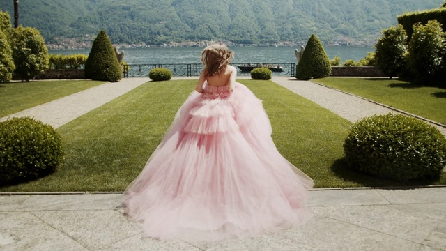 Video Reference: Gown, Dress, Clothing, Pink, Photograph, Wedding dress, Bridal clothing, Bridal party dress, Bride, Bridal accessory, Person