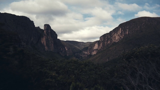 Video Reference: Mountainous landforms, Highland, Mountain, Sky, Wilderness, Escarpment, Valley, Badlands, Fell, Formation