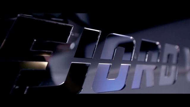 Video Reference: Text, Black, Automotive design, Font, Light, Logo, Darkness, Brand, Automotive exterior, Design