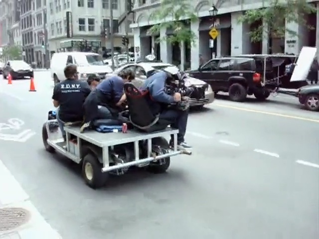 Video Reference: vehicle, car, motor vehicle, mode of transport, transport, asphalt, automotive exterior, street, Person