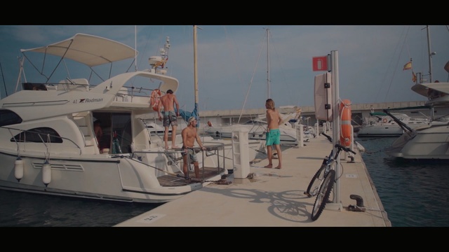 Video Reference: marina, boat, water, dock, boating, watercraft, yacht, sky, sailboat, vacation