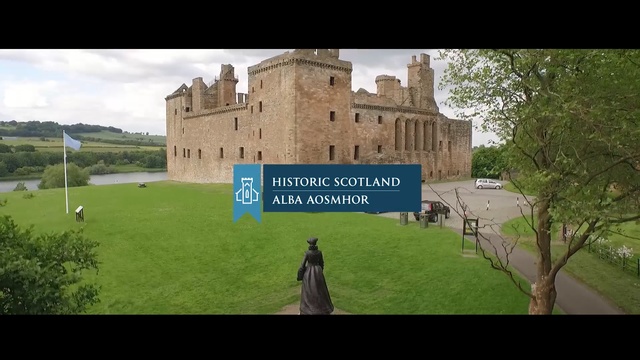 Video Reference: castle, landmark, property, château, building, grass, national trust for places of historic interest or natural beauty, historic site, medieval architecture, stately home