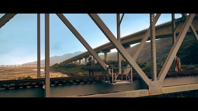 Video Reference: bridge, sky, fixed link, structure, reflection, water, cloud, girder bridge, sunlight, overpass