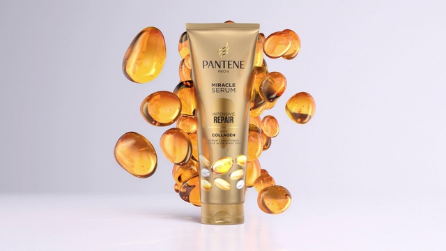 Video Reference: Amber, Orange, Drink, Font, Cylinder, Metal, Circle, Peach, Fashion accessory, Logo