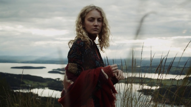 Video Reference: People in nature, Lady, Beauty, Water, Photography, Long hair, Grass, Sky, Adaptation, Person, Outdoor, Woman, Holding, Standing, Looking, Wearing, Smiling, Young, Man, Girl, Hand, White, Red, Boat, Phone, Shirt, Field, Riding, Snow, Sheep, Human face, Clothing, Cloud