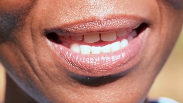 Video Reference: Tooth, Lip, Face, Nose, Mouth, Cheek, Skin, Close-up, Chin, Facial expression