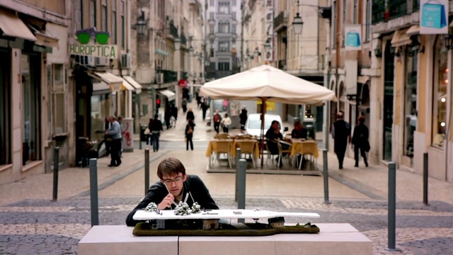 Video Reference: Town, Human settlement, Street, Urban area, Downtown, City, Mixed-use, Travel, Pedestrian, Neighbourhood