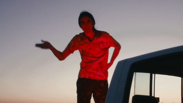 Video Reference: red, sky, fun, standing, male, shoulder, recreation, vacation, Person