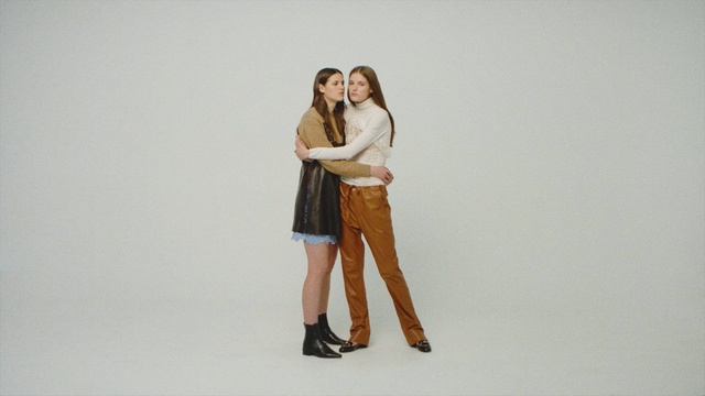 Video Reference: White, Standing, Fashion, Leg, Shoulder, Photography, Photo shoot, Joint, Footwear, Human body, Person