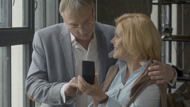 Video Reference: man, male, people, executive, senior, couple, person, happy, office, men, businessman