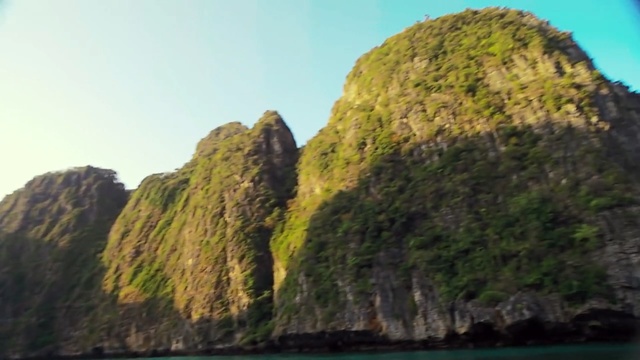 Video Reference: cliff, geological formation, landscape, mountain, rock, water, sea, sky, coast, travel