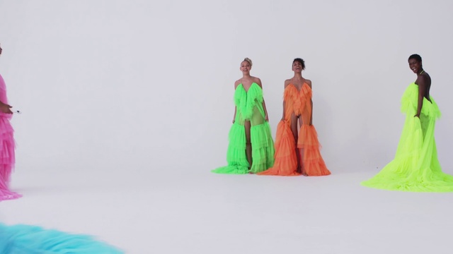 Video Reference: Clothing, Green, Dress, Fashion, Fashion design, Orange, Yellow, Formal wear, Haute couture, Shoulder