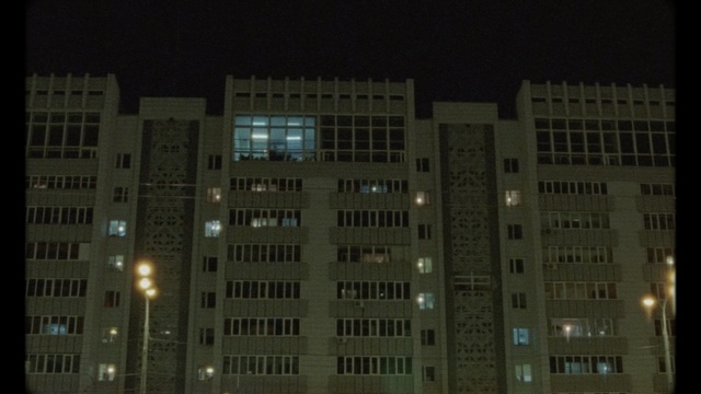Video Reference: building, metropolis, urban area, night, skyscraper, city, metropolitan area, architecture, tower block, downtown, Person