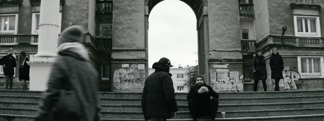 Video Reference: photograph, black and white, infrastructure, monochrome photography, urban area, snapshot, street, photography, building, pedestrian, Person