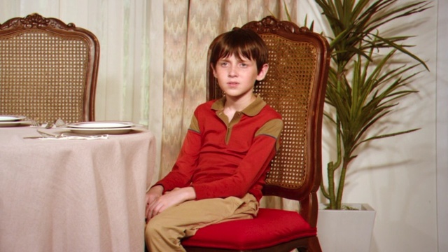 Video Reference: Sitting, Furniture, Chair, Room, Wicker, Interior design, Comfort, Person