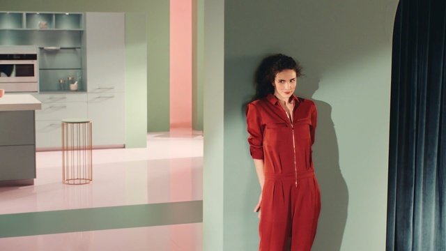 Video Reference: Pink, Red, Fashion, Room, Outerwear, Dress, Formal wear, Fashion design, Person