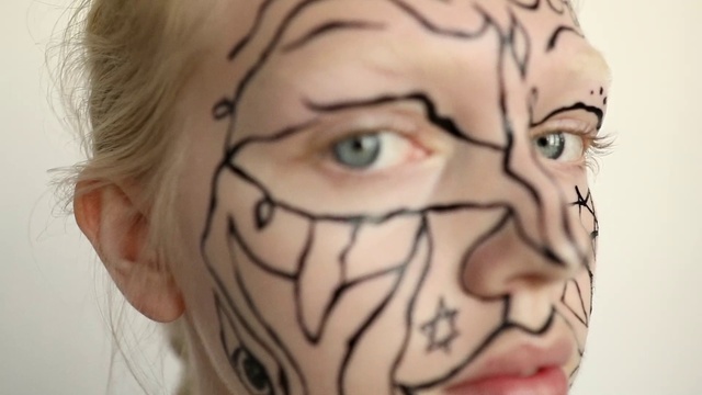 Video Reference: Face, Cheek, Forehead, Skin, Head, Nose, Eyebrow, Chin, Tattoo, Mouth