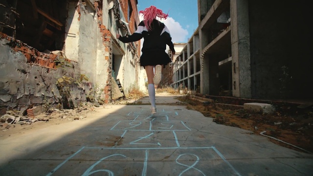 Video Reference: infrastructure, urban area, wall, road, sky, street, recreation, girl, city, shadow