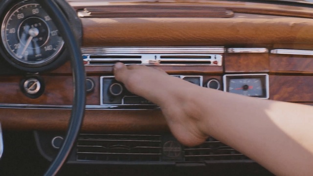 Video Reference: car, motor vehicle, vehicle, steering part, steering wheel, automotive design, personal luxury car, family car, automotive exterior, vintage car