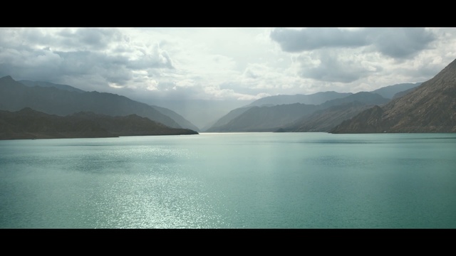Video Reference: Body of water, Sky, Nature, Water, Highland, Water resources, Lake, Mountainous landforms, Mountain, Mountain range