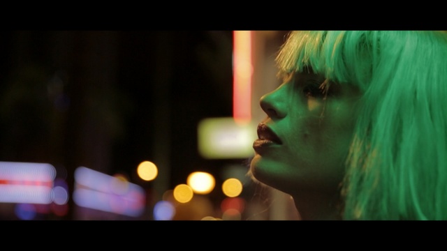 Video Reference: green, girl, darkness, human, black hair, scene, fun, night, midnight, song, Person