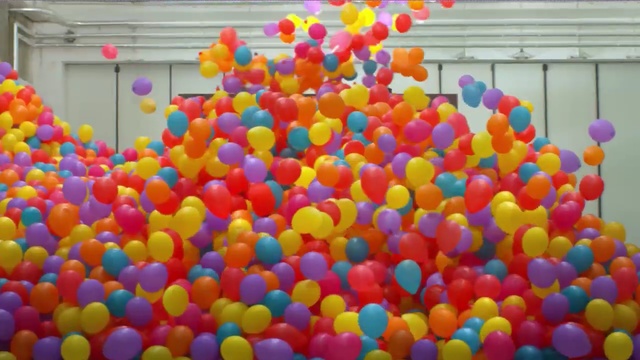 Video Reference: ball pit, yellow, balloon, toy, play, Person