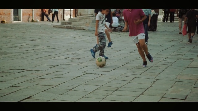 Video Reference: infrastructure, road, street, street football, fun, street game, recreation, play, sports, girl, Person