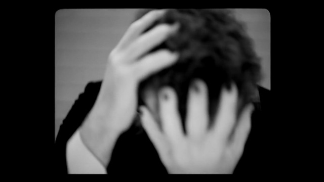 Video Reference: Hair, Photograph, Black, Facial expression, Hand, Black-and-white, Monochrome photography, Hairstyle, Photography, Beauty