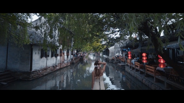 Video Reference: waterway, water, body of water, town, reflection, canal, tree, rain, street, river