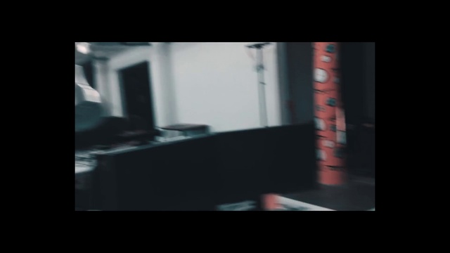 Video Reference: Black, Light, Darkness, Text, Snapshot, Display device, Font, Room, Architecture, Line
