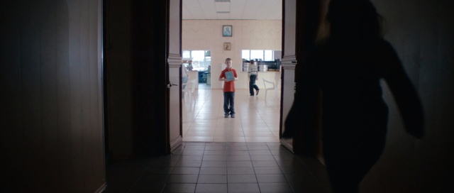 Video Reference: light, snapshot, darkness, standing, girl, window, tourist attraction, fun, Person