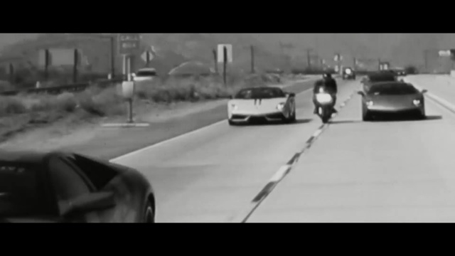 Video Reference: Vehicle, Mode of transport, Car, Automotive design, Photography, Black-and-white, Road, Lane, Performance car, Supercar