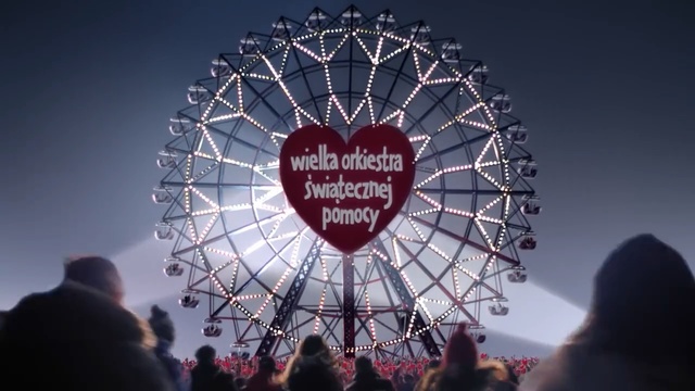 Video Reference: Sky, Ferris wheel, Landmark, Tourist attraction, Fun, Organ, Crowd, Recreation, Font, Cloud, Person