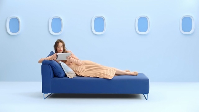 Video Reference: blue, furniture, couch, product, bed, sofa bed, product, comfort, chair, chaise longue, Person