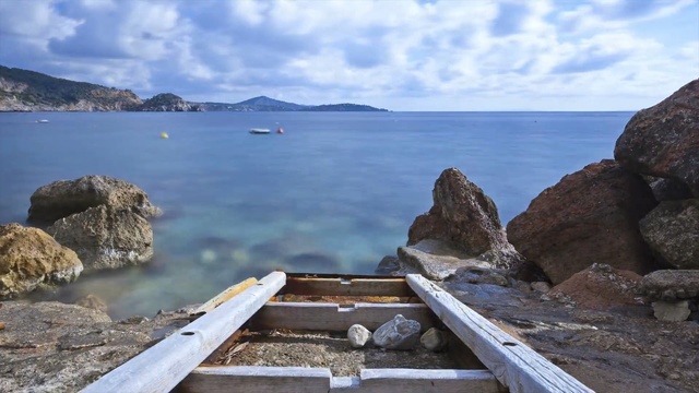 Video Reference: sea, coast, water, sky, coastal and oceanic landforms, promontory, rock, ocean, cloud, bay, Person