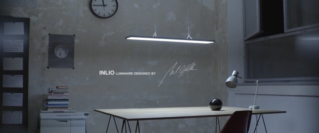 Video Reference: Wall, Blackboard, Room, Office supplies, Furniture, Interior design, Table, Whiteboard, Person