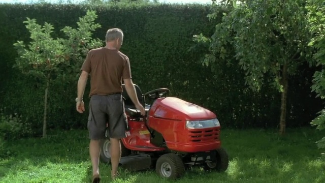 Video Reference: Land vehicle, Vehicle, Lawn, Mower, Lawn mower, Grass, Riding mower, Outdoor power equipment, Gardener, Yard, Person