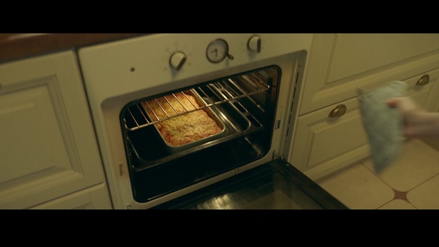 Video Reference: home appliance, kitchen appliance, screenshot, floor, major appliance, flooring, oven, Person