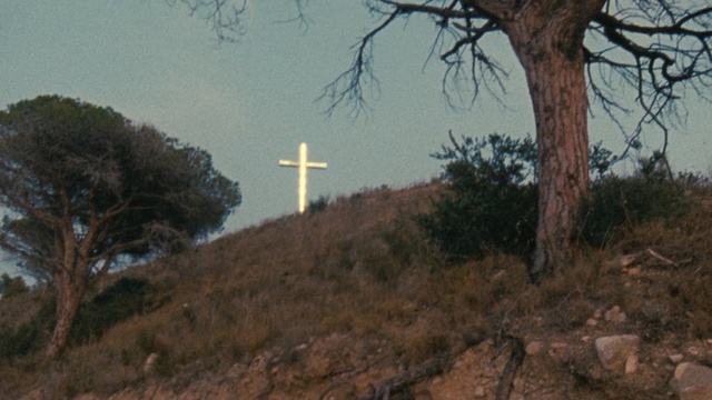 Video Reference: Cross, Religious item, Sky, Symbol, Tree, Hill