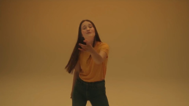 Video Reference: Shoulder, Standing, Arm, Yellow, Joint, Human body, Long hair, Fun, Gesture, Photography, Person