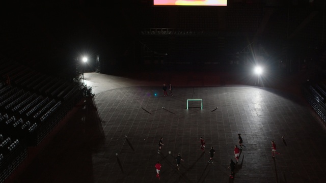 Video Reference: Light, Sky, Stage, Performance, Sport venue, Architecture, Night, Arena, Cloud, Outdoor, Dark, Street, Red, Large, Table, People, City, Standing, Group, Sign, Water, Snow, Skiing, Traffic, White, Text